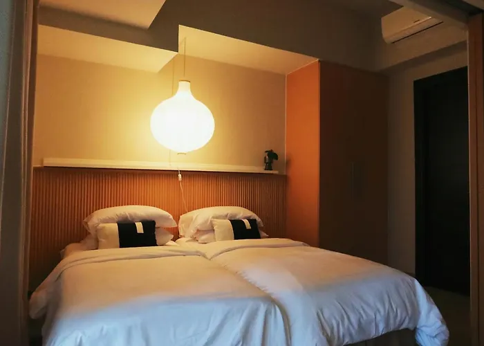 Muji 1br In Uptown Parksuites Bgc Aparthotel *